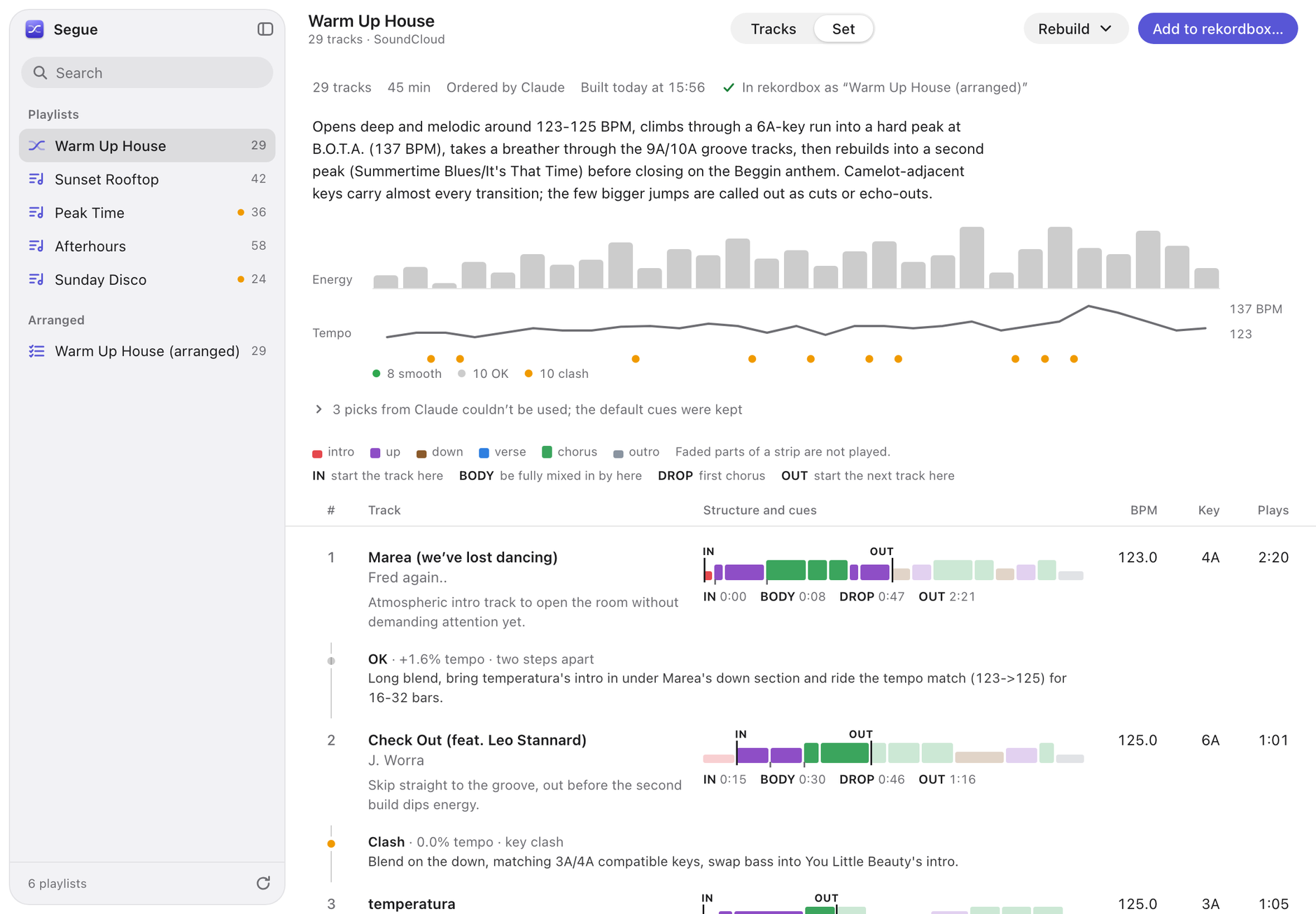 Segue's Set view: an ordered 29-track set with an energy curve, a tempo line, phrase strips with cue points and a mixing note for each transition.